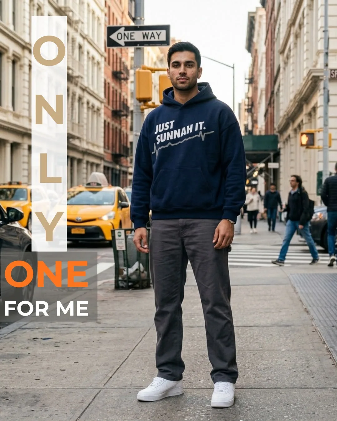 Model in the navy Just Sunnah It hoodie on a New York street